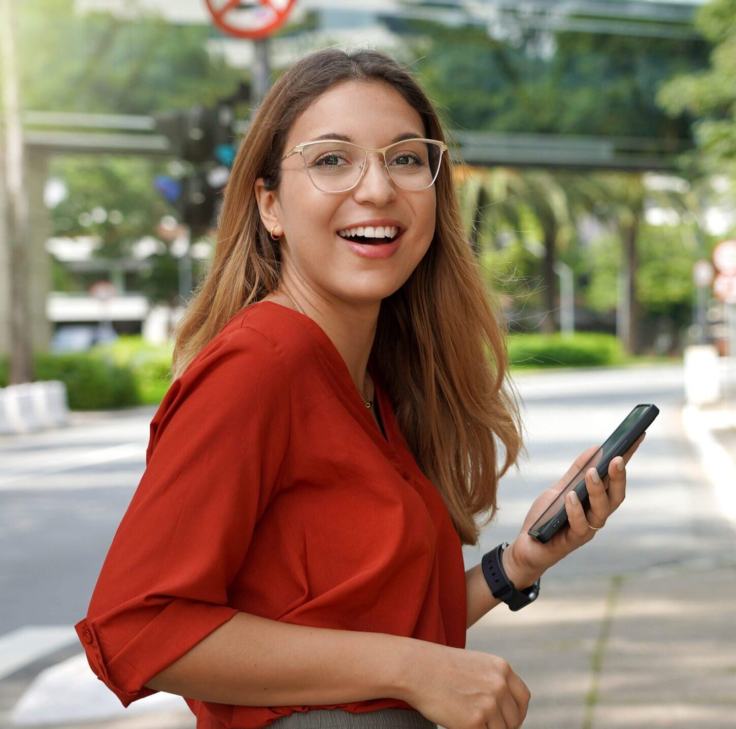 Brazilian Lively Confident Woman Smiling At Camera Holding Smart plan b