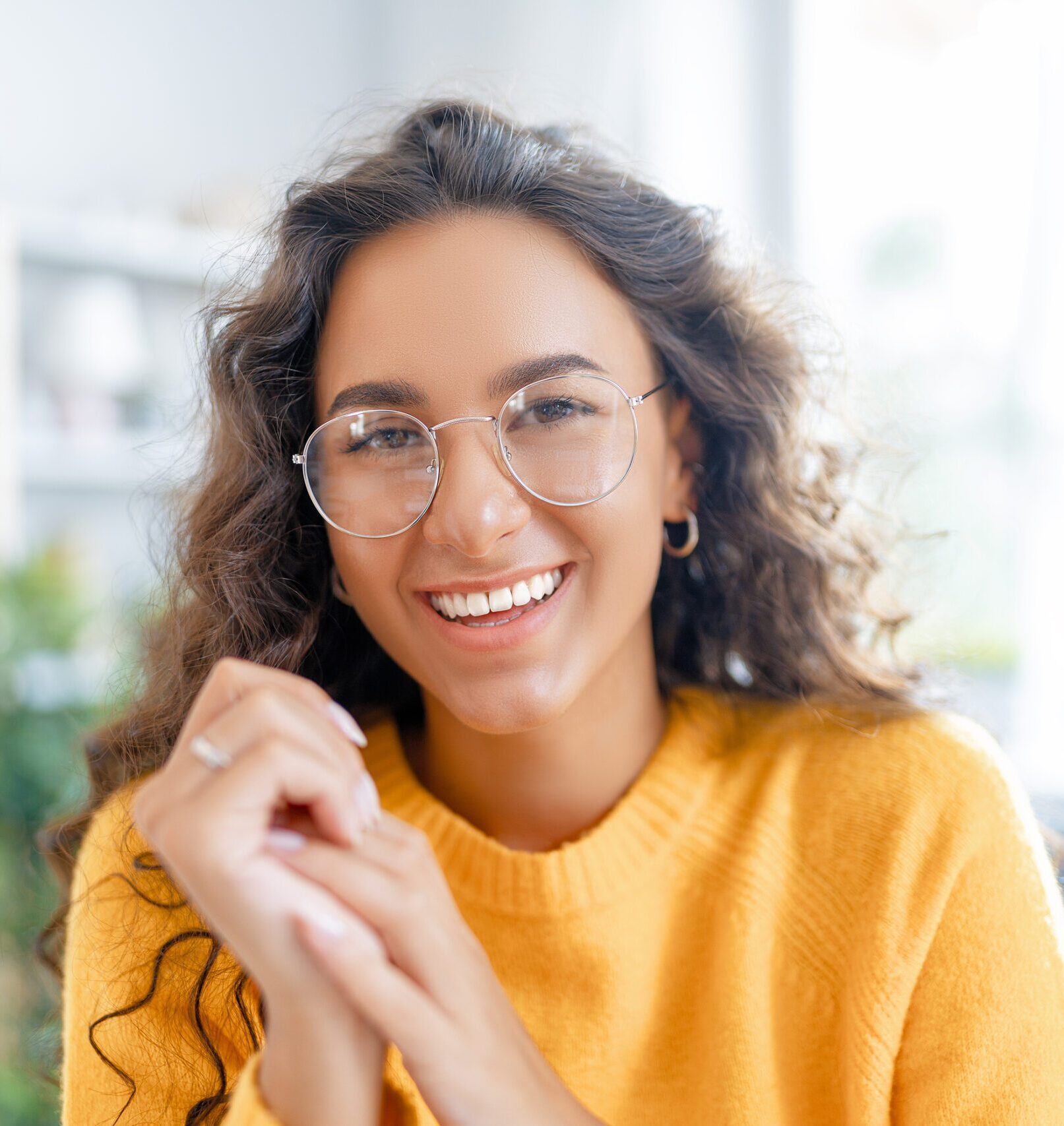 Portrait of beautiful woman resting and talking with somebody a Common pregnancy symptoms